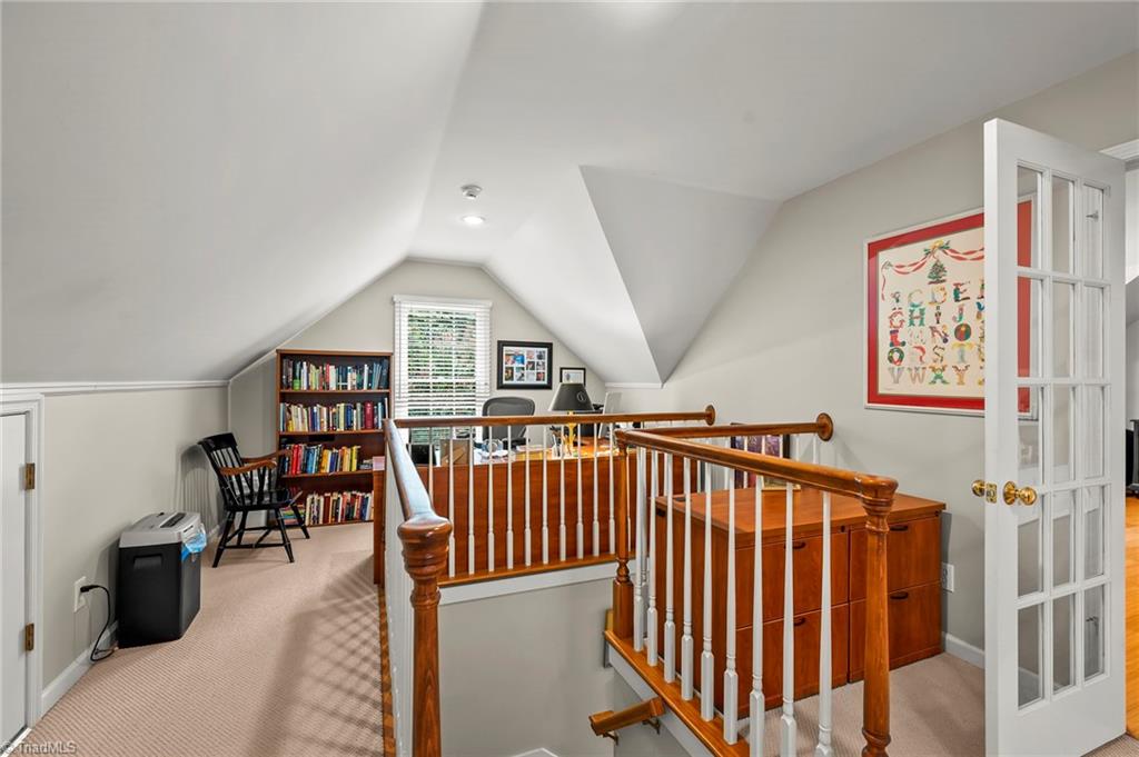 1457 Ridgemere Lane Winston-Salem, NC 27106 - Photo 28 of 39 The playroom was unfinished attic space and the owners added the bump out to make the window seat