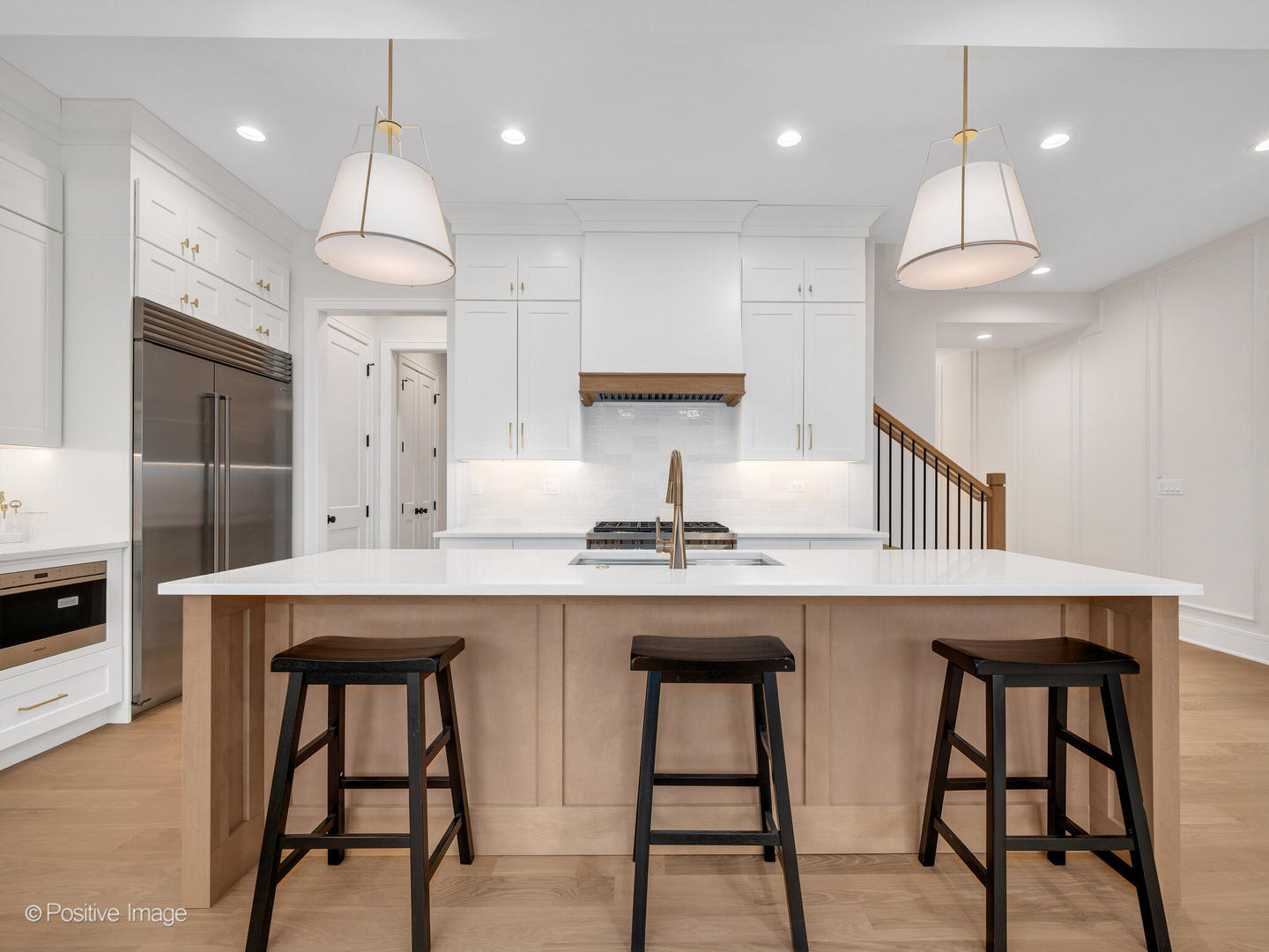 104 Evergreen Avenue Elmhurst, IL 60126 - Photo 16 of 41 a kitchen with granite countertop a table chairs refrigerator and microwave