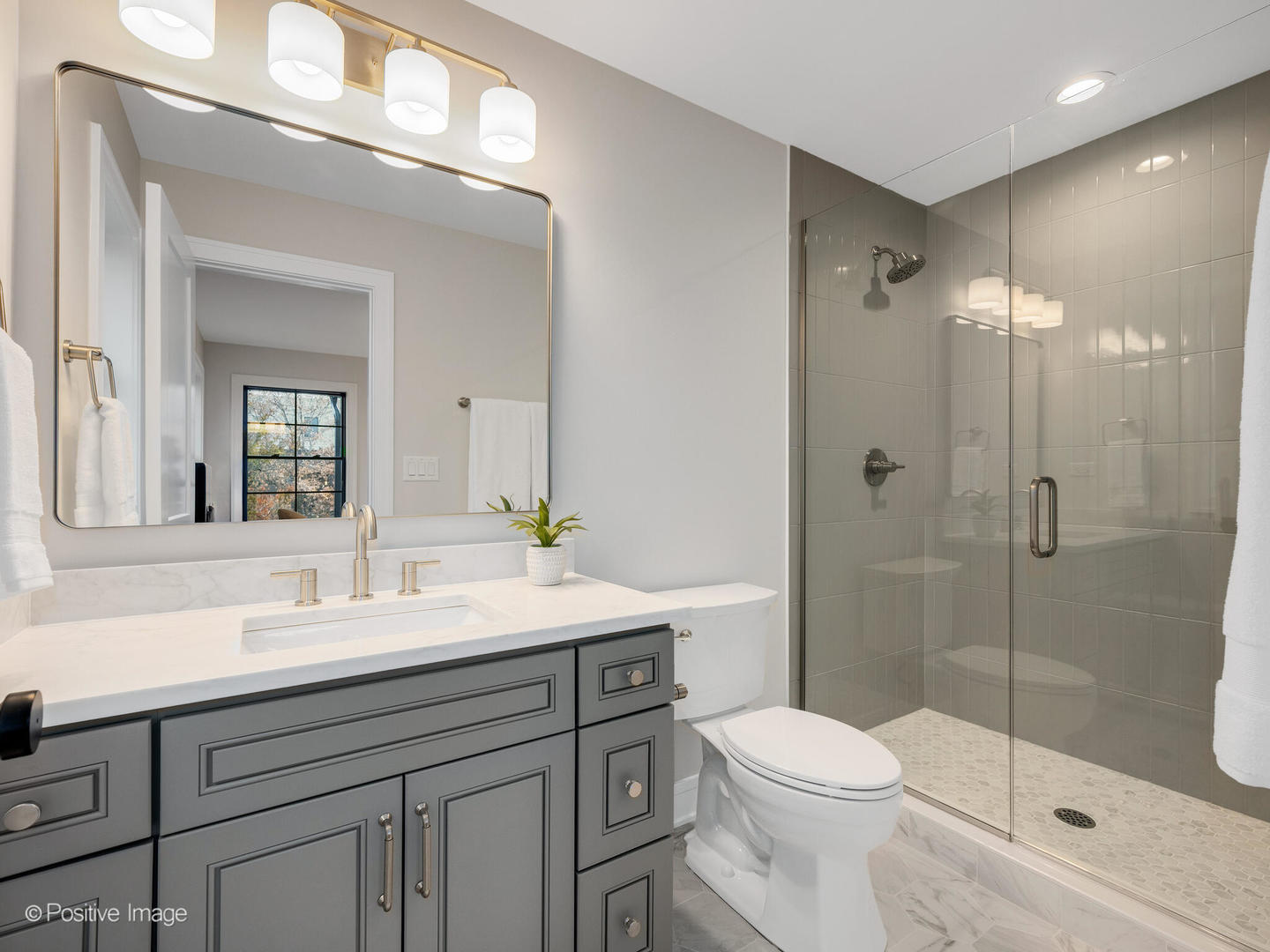 104 Evergreen Avenue Elmhurst, IL 60126 - Photo 30 of 41 a bathroom with a sink a toilet and shower