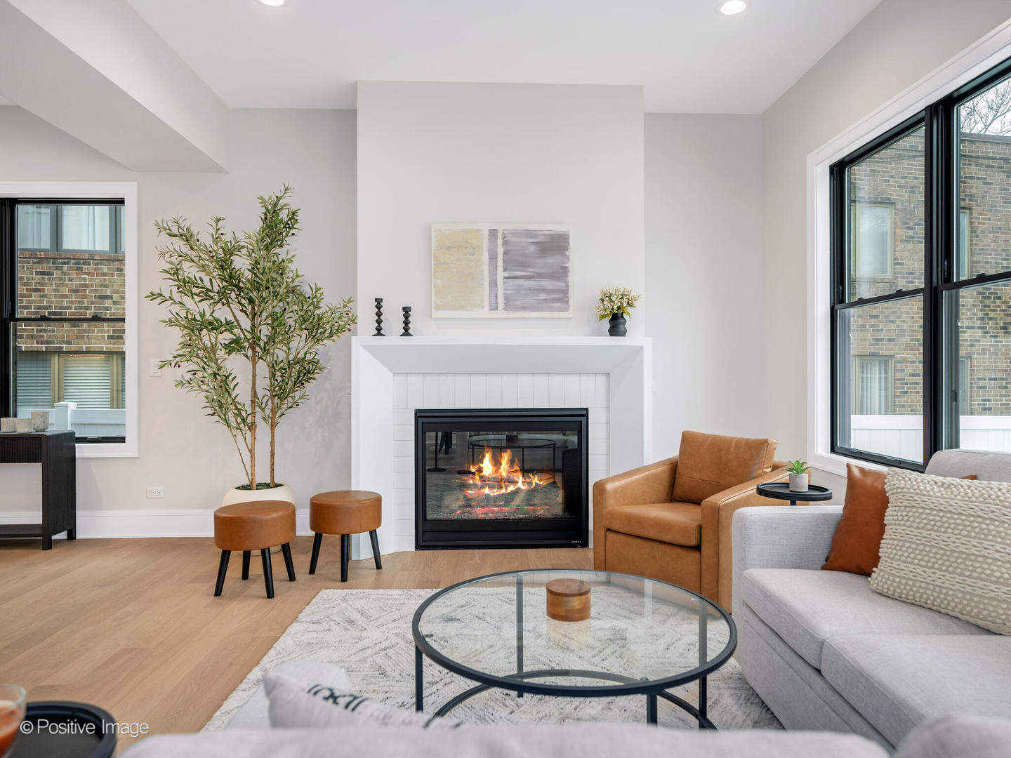 104 Evergreen Avenue Elmhurst, IL 60126 - Photo 5 of 41 a living room with furniture and a fireplace