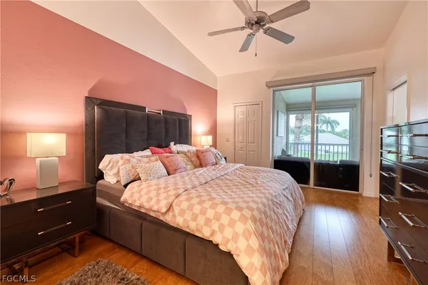 a bed room with a bed and a window