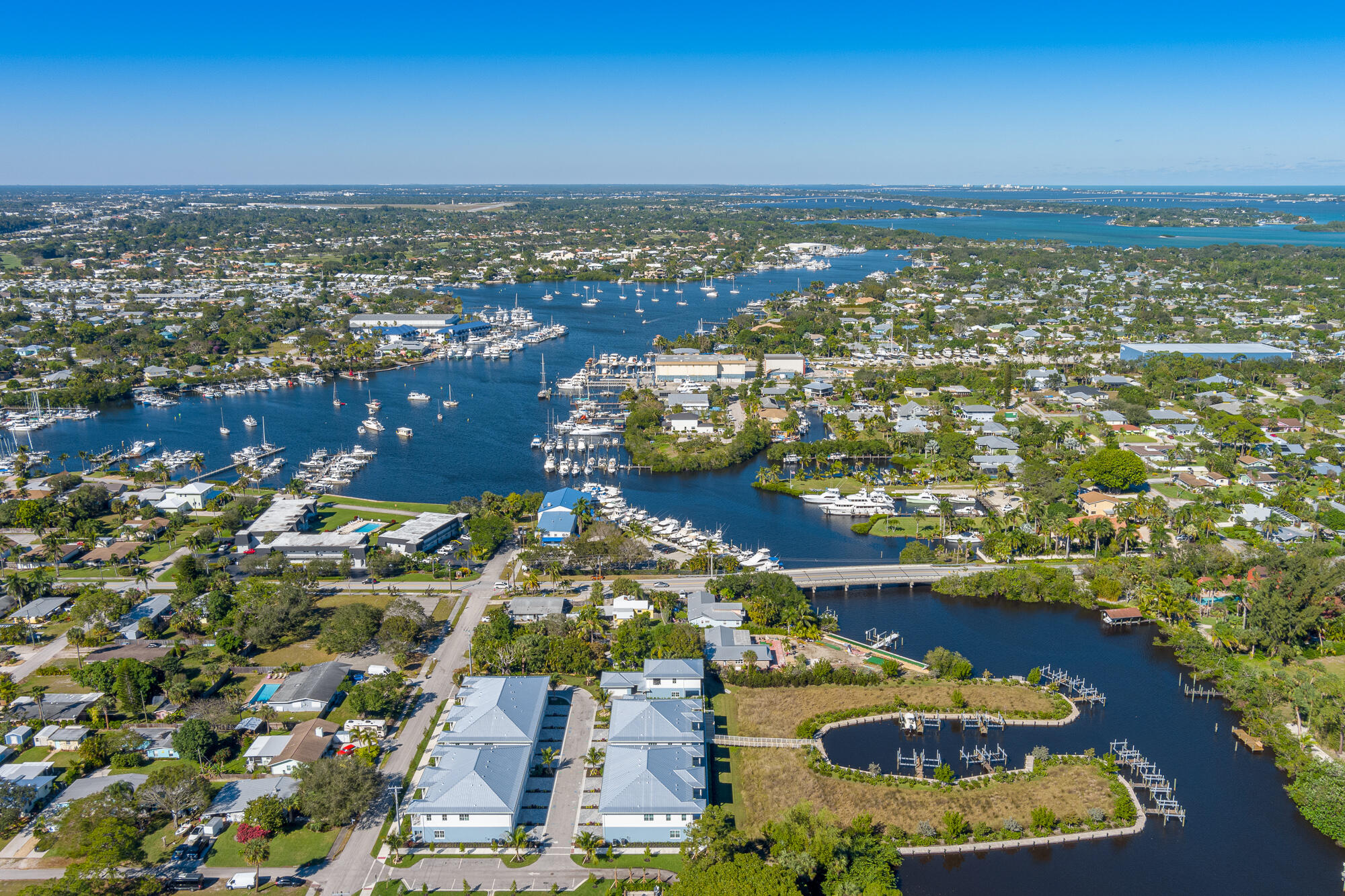 4680 Southeast Manatee Terrace Stuart, FL 34997 - Photo 30 of 34 an aerial view of residential houses with outdoor space