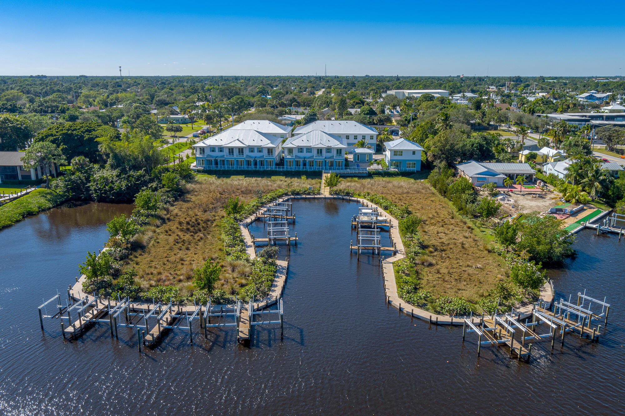 4680 Southeast Manatee Terrace Stuart, FL 34997 - Photo 31 of 34 an aerial view of a house with a ocean view