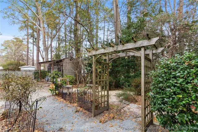 a backyard of a house with lots of green space