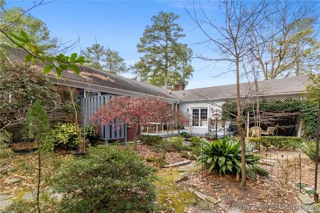 a house view with a garden space