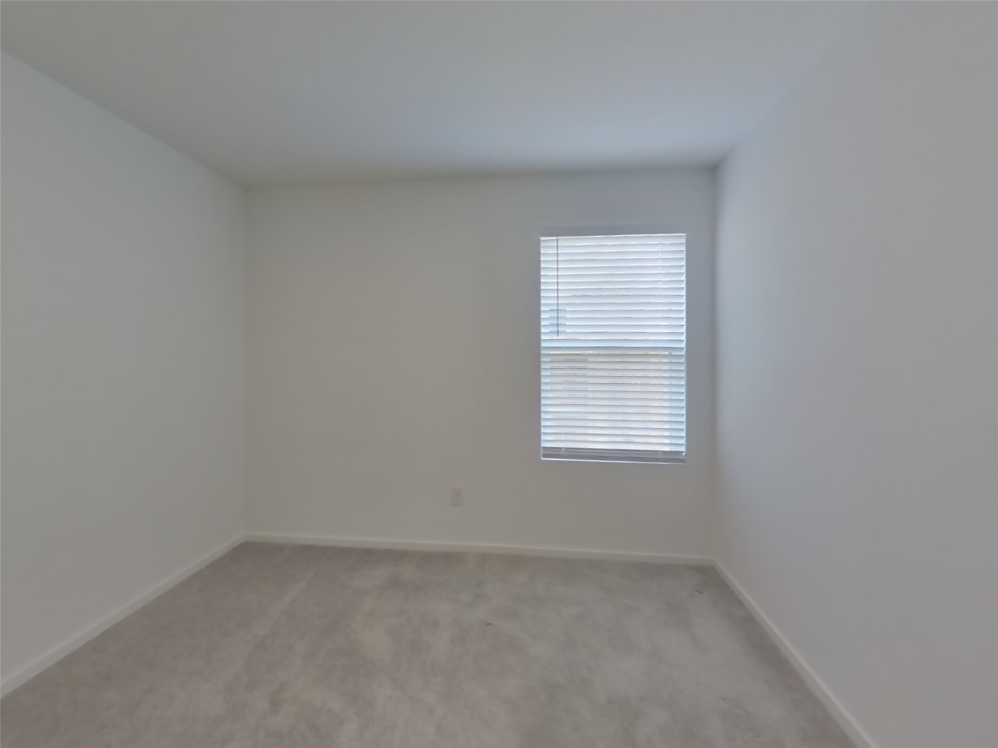 3009 Merganser Ridge Drive Katy, TX 77493 - Photo 13 of 18 an empty room with a window