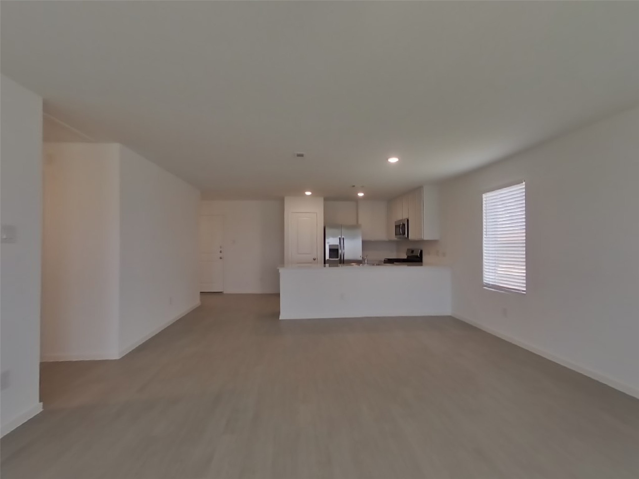 3009 Merganser Ridge Drive Katy, TX 77493 - Photo 3 of 18 a view of kitchen and kitchen with a window