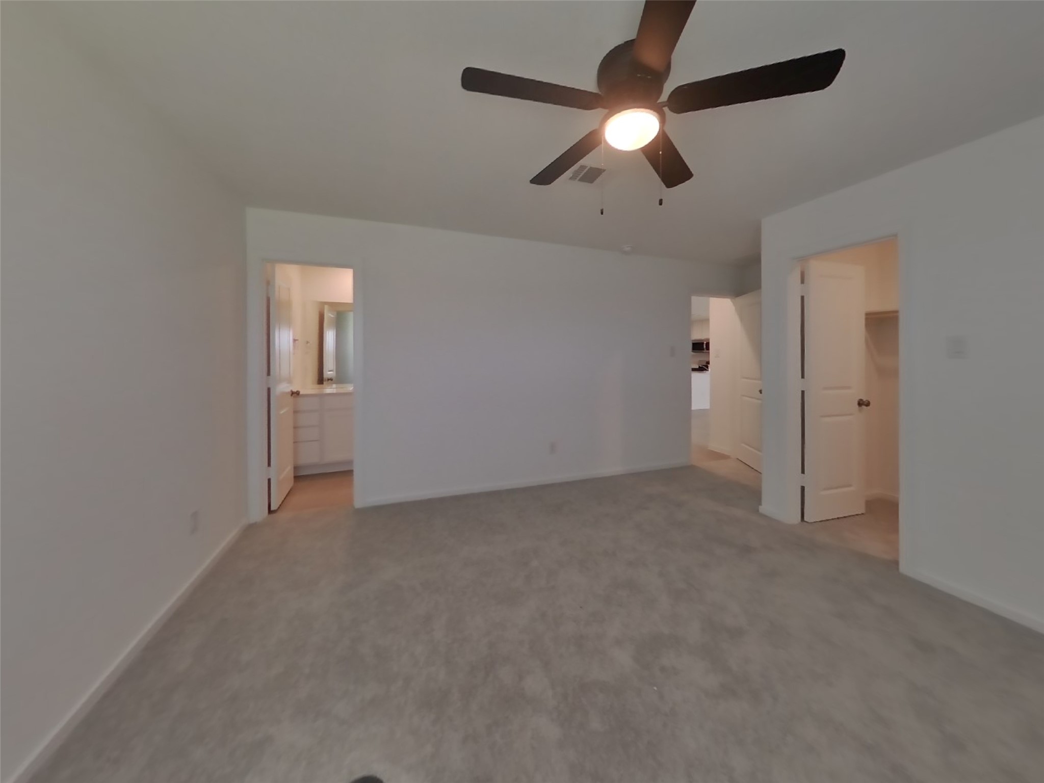 3009 Merganser Ridge Drive Katy, TX 77493 - Photo 8 of 18 an empty room with chandelier fan