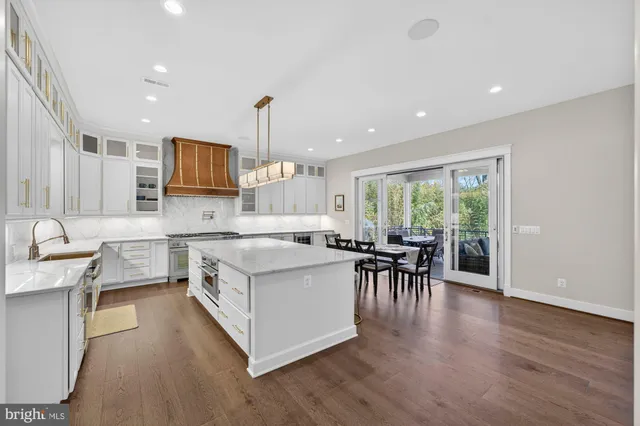 a view of a room with gym equipment and a large window