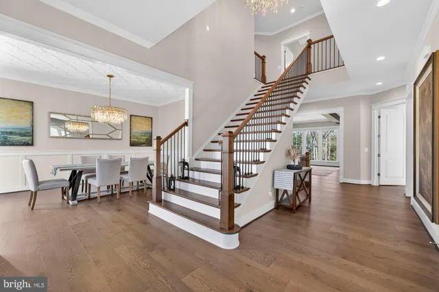 a kitchen with granite countertop a sink and a stove next to a window