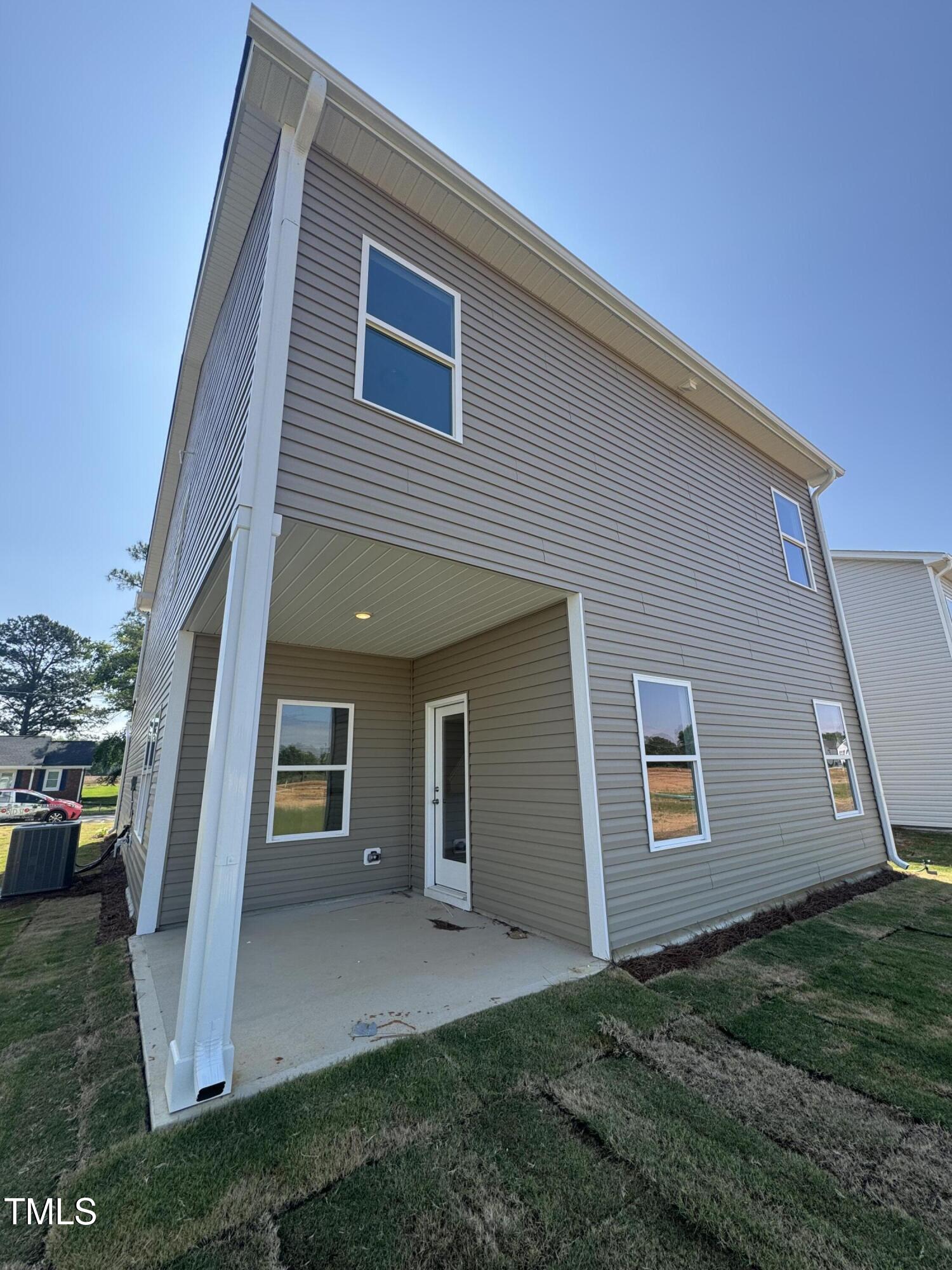 176 Bruce Drive Dunn, NC 28334 - Photo 12 of 30 a view of a house with a yard