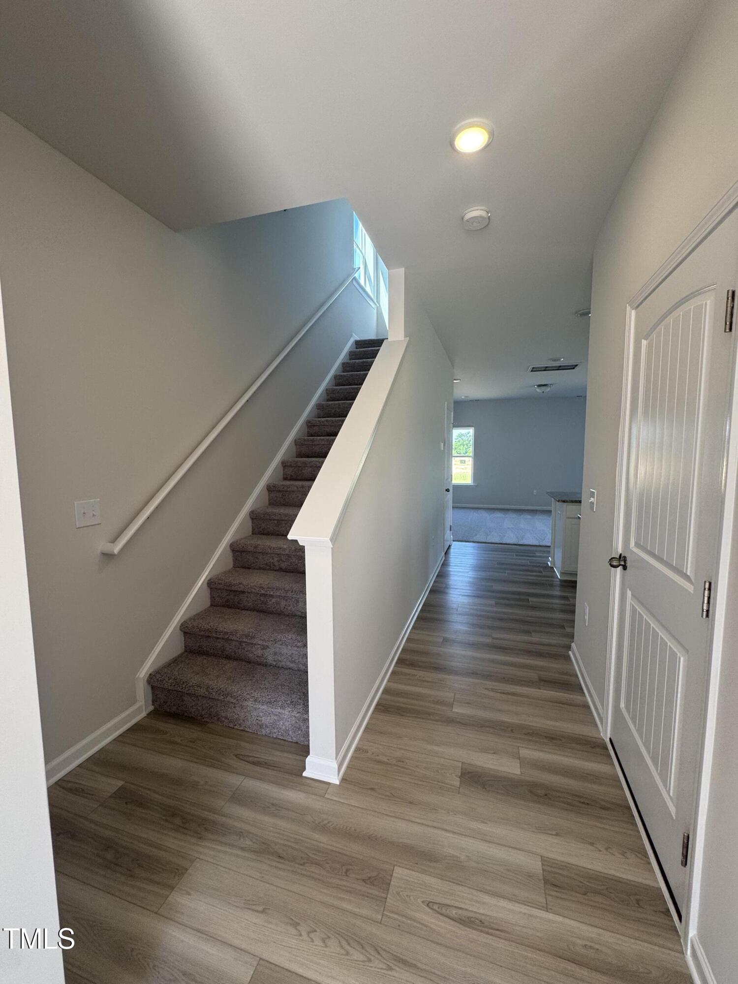 176 Bruce Drive Dunn, NC 28334 - Photo 6 of 30 a view of a hallway view with staircase
