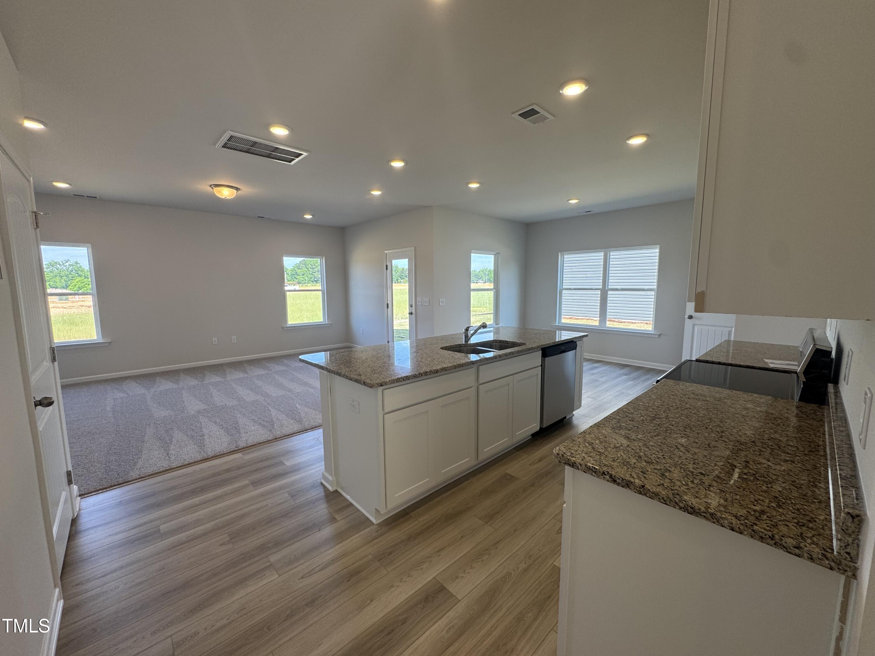 176 Bruce Drive Dunn, NC 28334 - Photo 7 of 30 a large kitchen with lots of counter space