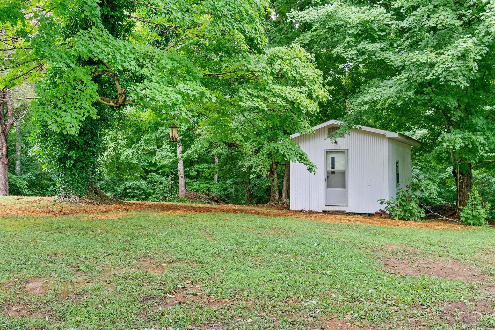 1074 A North Corinth Road Portland, TN 37148 - Photo 22 of 25 a house with a yard