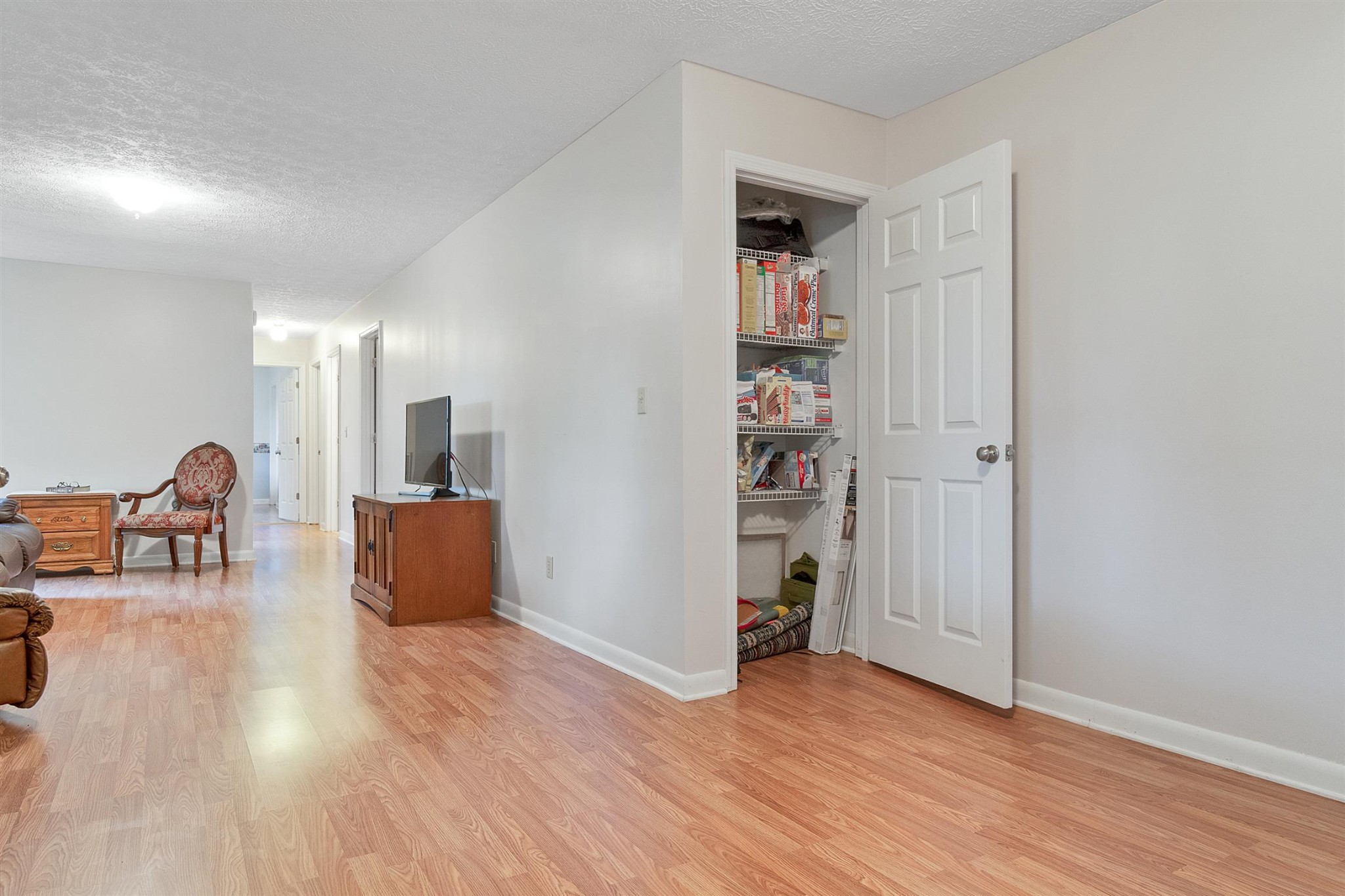 1074 A North Corinth Road Portland, TN 37148 - Photo 6 of 25 a view of empty room with wooden floor