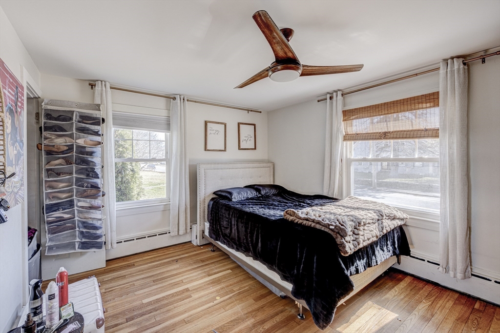707 Hathaway Road New Bedford, MA 02740 - Photo 17 of 33 a bedroom with a bed and a large window