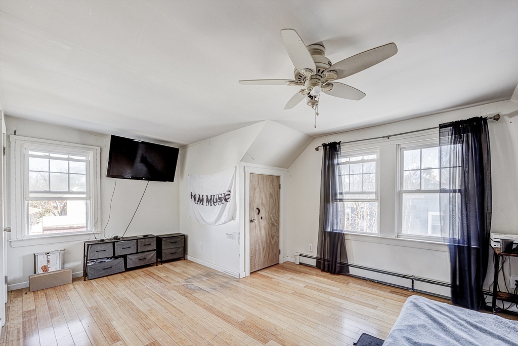 707 Hathaway Road New Bedford, MA 02740 - Photo 25 of 33 a living room with furniture and a flat screen tv