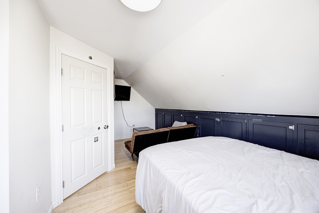 707 Hathaway Road New Bedford, MA 02740 - Photo 28 of 33 a bedroom with a bed and a cabinets