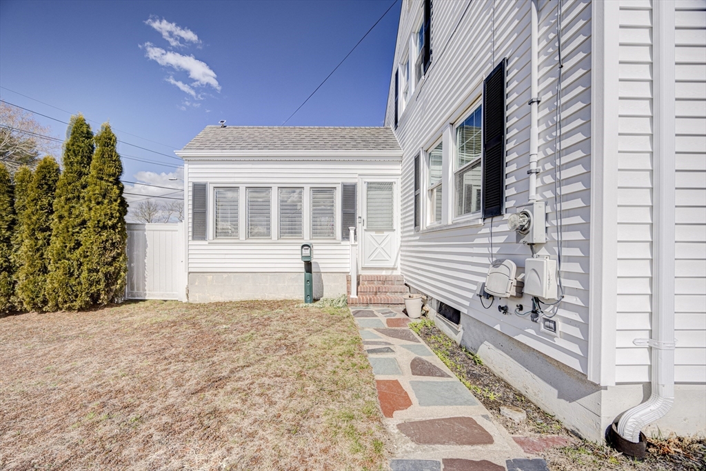707 Hathaway Road New Bedford, MA 02740 - Photo 3 of 33 a view of a house with a balcony