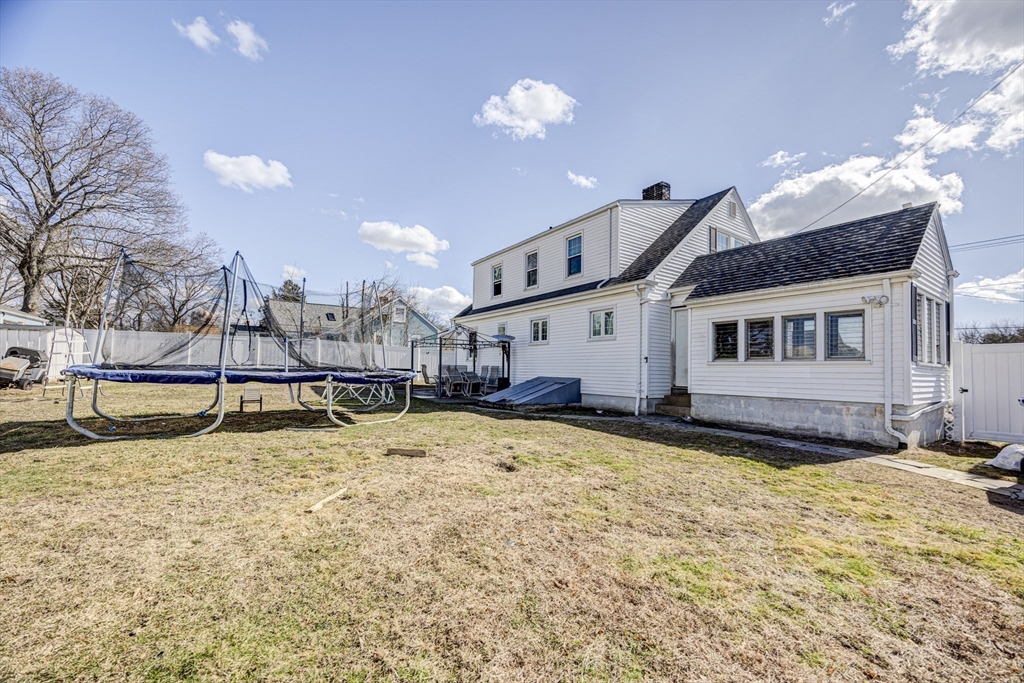 707 Hathaway Road New Bedford, MA 02740 - Photo 31 of 33 a view of a house with swimming pool and sitting area