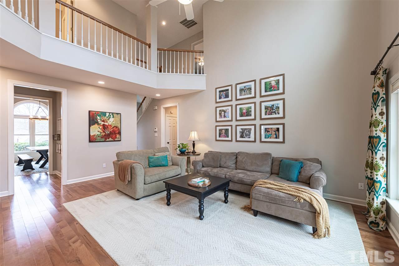 8901 Breeland Way Raleigh, NC 27613 - Photo 2 of 24 a living room with furniture and a window