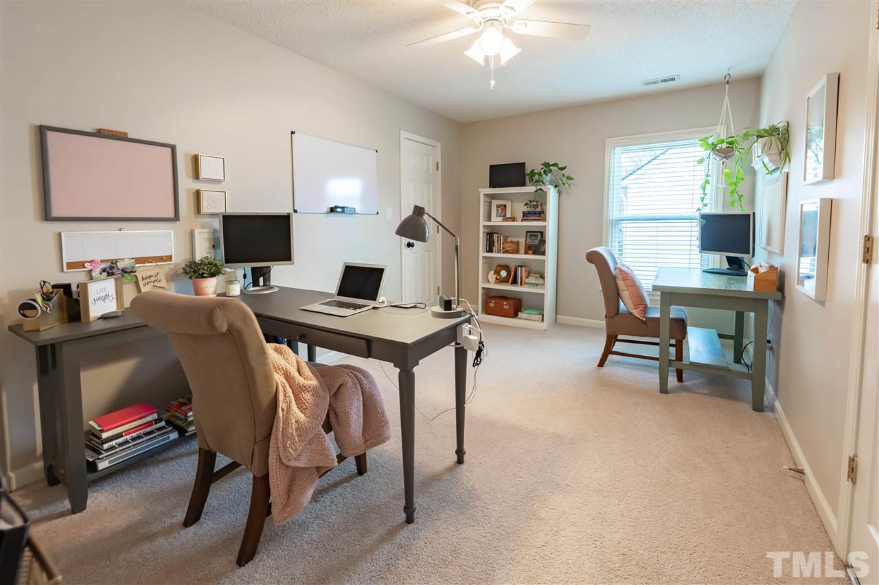 8901 Breeland Way Raleigh, NC 27613 - Photo 18 of 24 a workspace with furniture and window