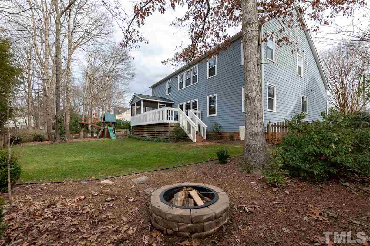 8901 Breeland Way Raleigh, NC 27613 - Photo 24 of 24 a view of a house with backyard