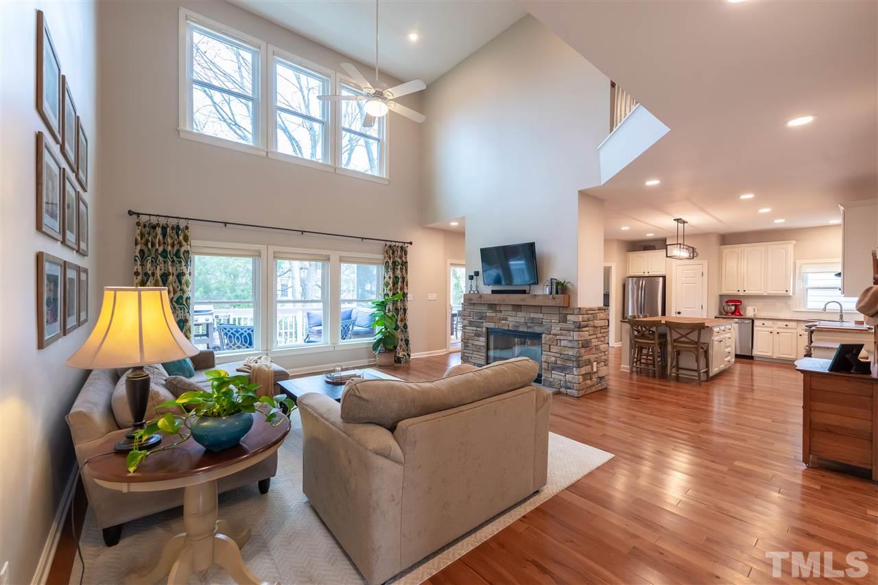 8901 Breeland Way Raleigh, NC 27613 - Photo 7 of 24 a living room with furniture and a large window