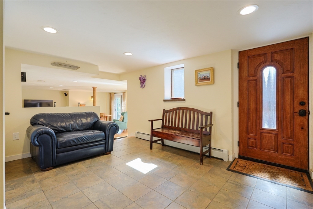 58 Pine Hill Road Southborough, MA 01772 - Photo 12 of 42 a livingroom with furniture and a window