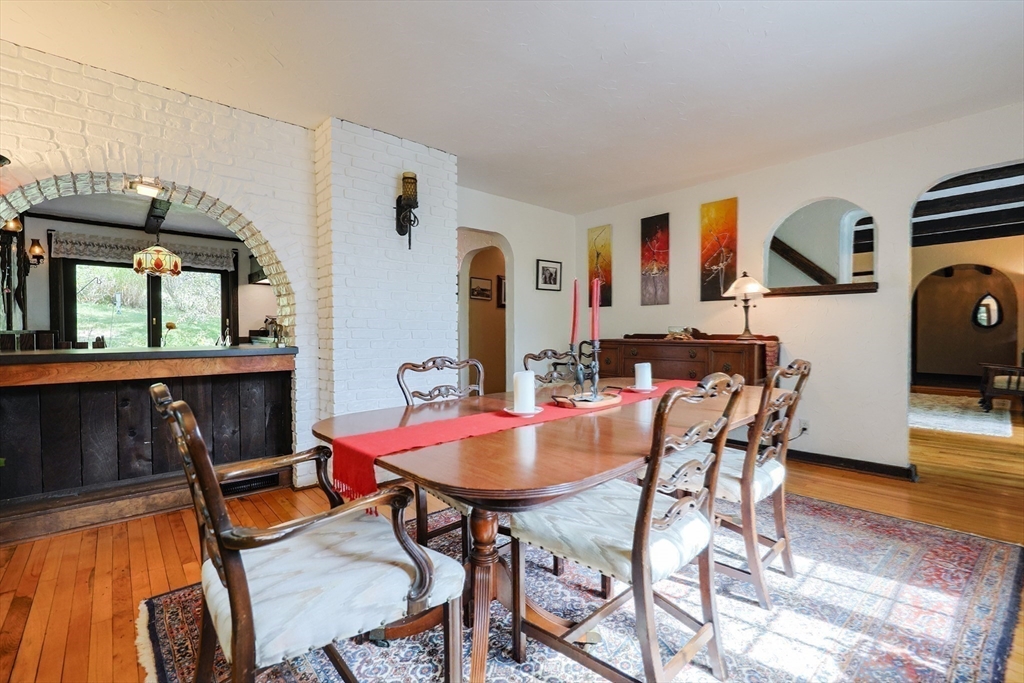 58 Pine Hill Road Southborough, MA 01772 - Photo 19 of 42 a view of a dining room with furniture and wooden floor