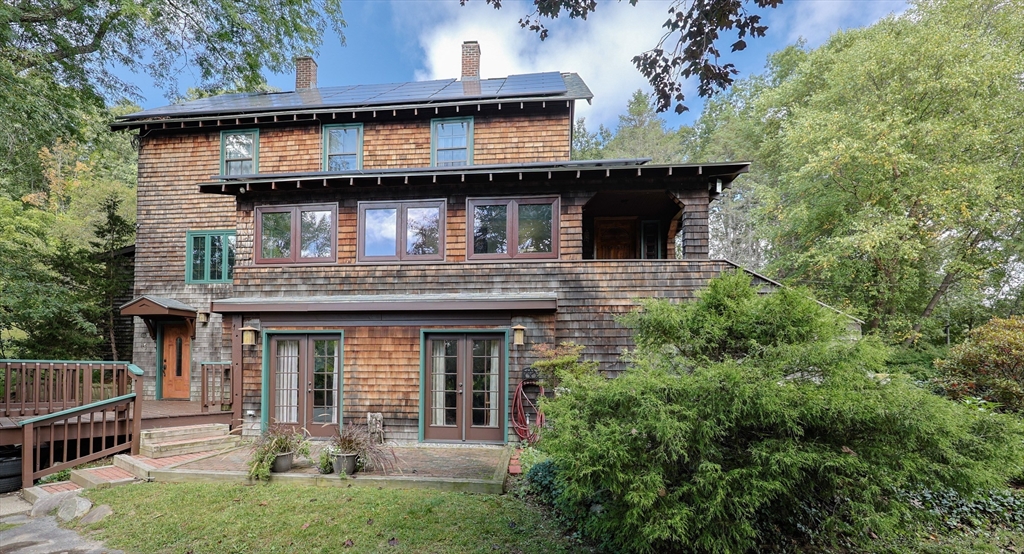 58 Pine Hill Road Southborough, MA 01772 - Photo 2 of 42 front view of a house with a yard