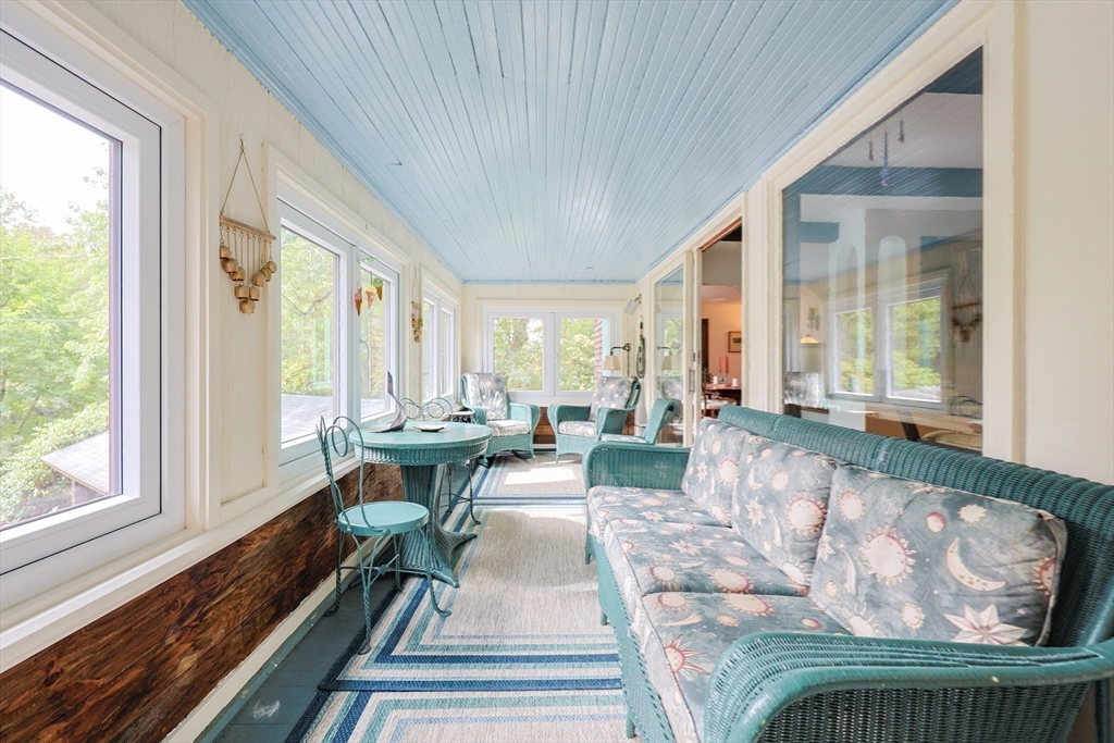 58 Pine Hill Road Southborough, MA 01772 - Photo 21 of 42 a living room with furniture and a large window