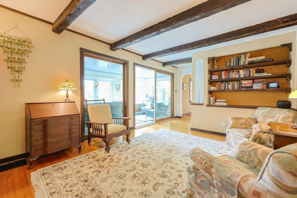 58 Pine Hill Road Southborough, MA 01772 - Photo 22 of 42 a living room with furniture a rug and a large window