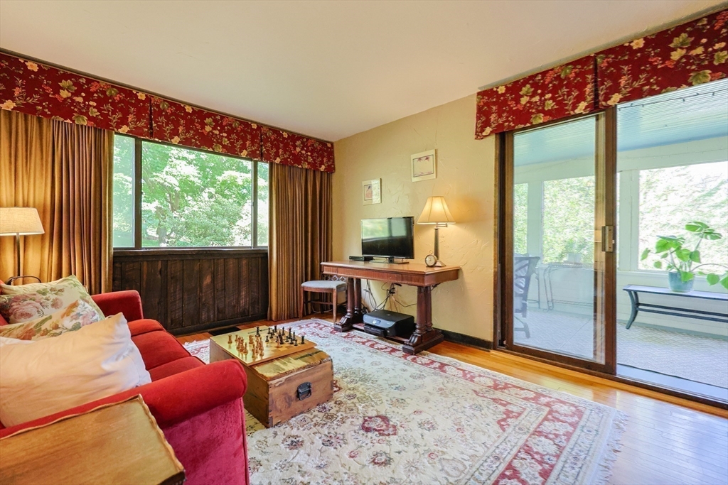 58 Pine Hill Road Southborough, MA 01772 - Photo 27 of 42 a bedroom with a bed and large windows