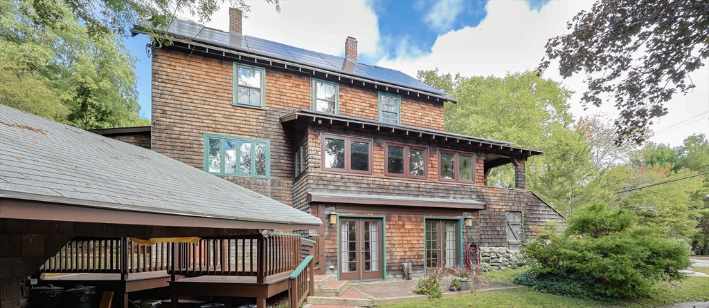 58 Pine Hill Road Southborough, MA 01772 - Photo 3 of 42 a front view of a house with a balcony