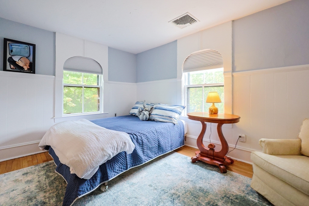 58 Pine Hill Road Southborough, MA 01772 - Photo 32 of 42 a bedroom with a bed a dresser and window