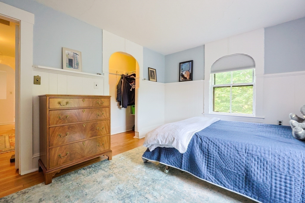 58 Pine Hill Road Southborough, MA 01772 - Photo 33 of 42 a bedroom with a bed and window