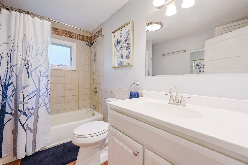 58 Pine Hill Road Southborough, MA 01772 - Photo 34 of 42 a bathroom with a sink a toilet and a bathtub