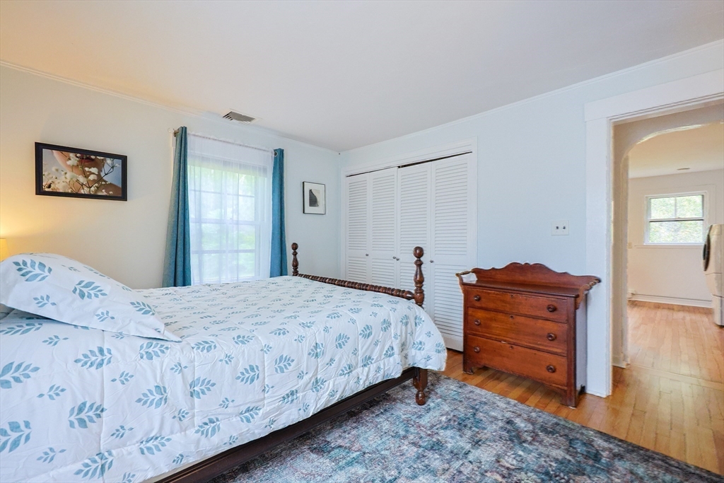 58 Pine Hill Road Southborough, MA 01772 - Photo 36 of 42 a bedroom with a bed and a dresser