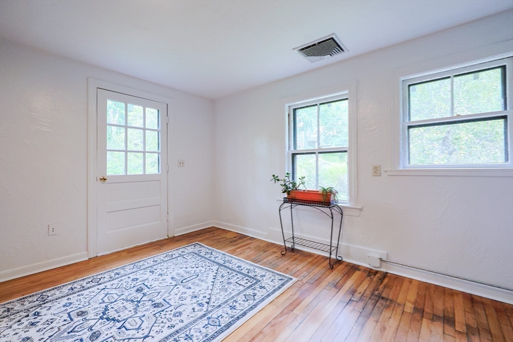58 Pine Hill Road Southborough, MA 01772 - Photo 38 of 42 a view of an empty room and window