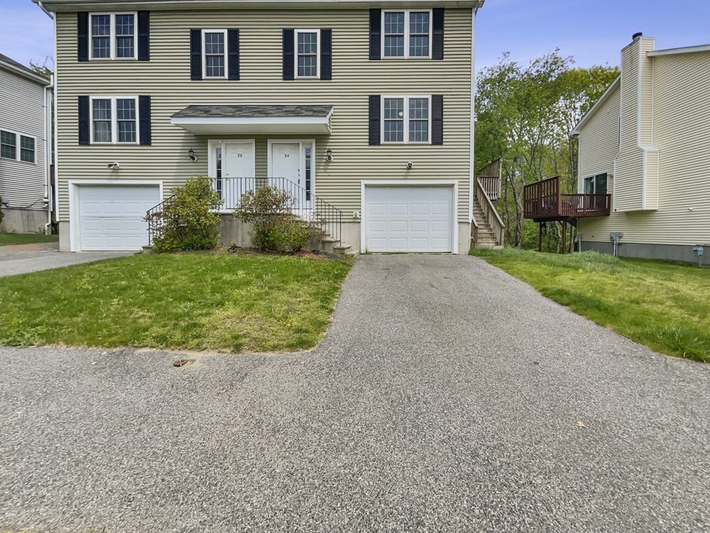 24 Sophia Drive Worcester, MA 01607 - Photo 1 of 30 a front view of a house with garden