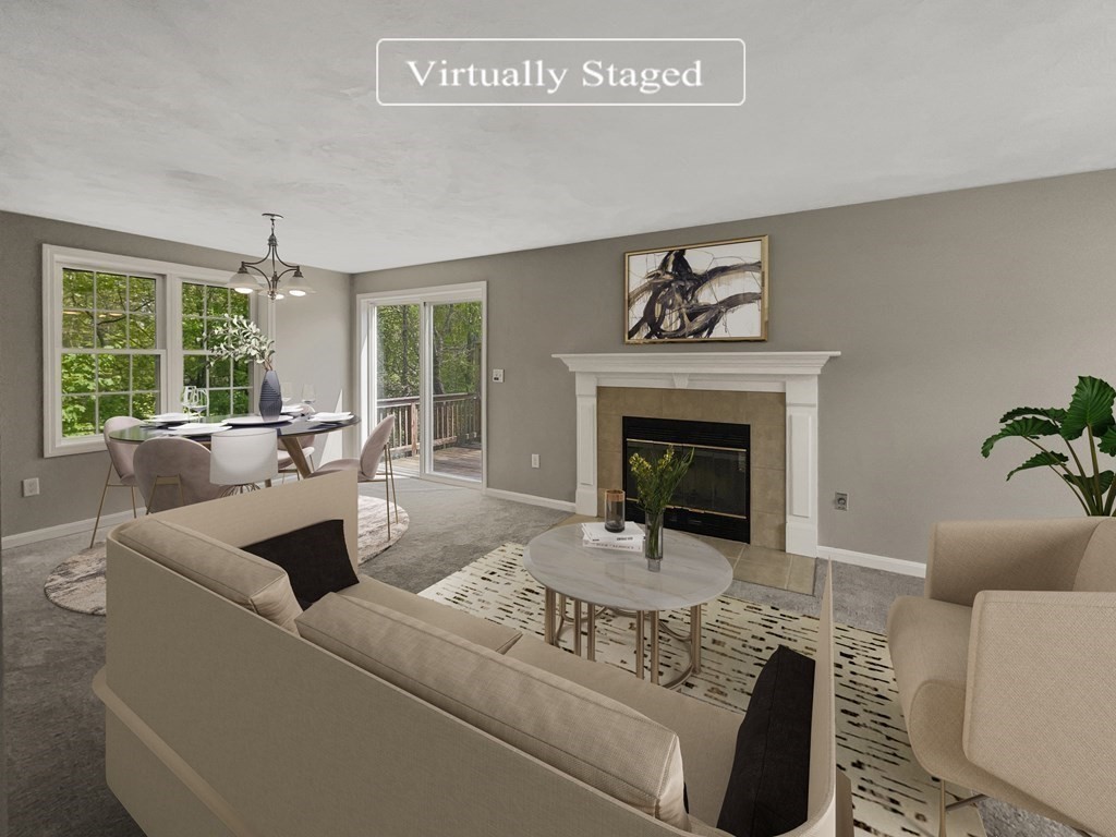 24 Sophia Drive Worcester, MA 01607 - Photo 2 of 30 a living room with furniture and a fireplace