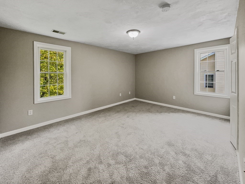 24 Sophia Drive Worcester, MA 01607 - Photo 5 of 30 an empty room with a window
