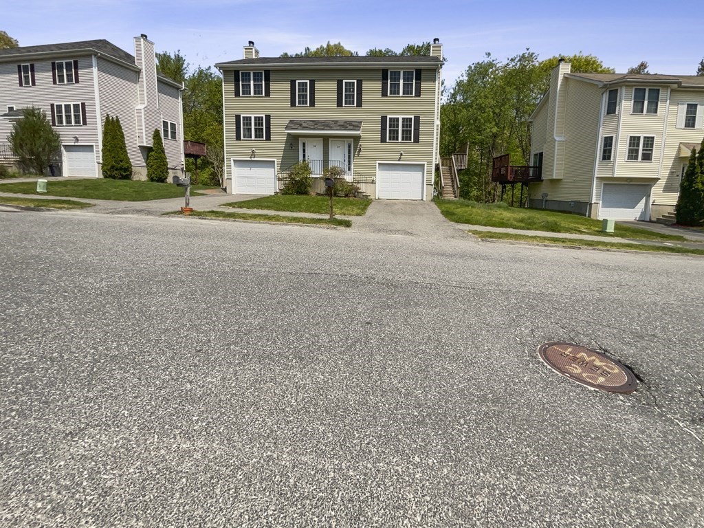 24 Sophia Drive Worcester, MA 01607 - Photo 6 of 30 a view of residential houses with a street