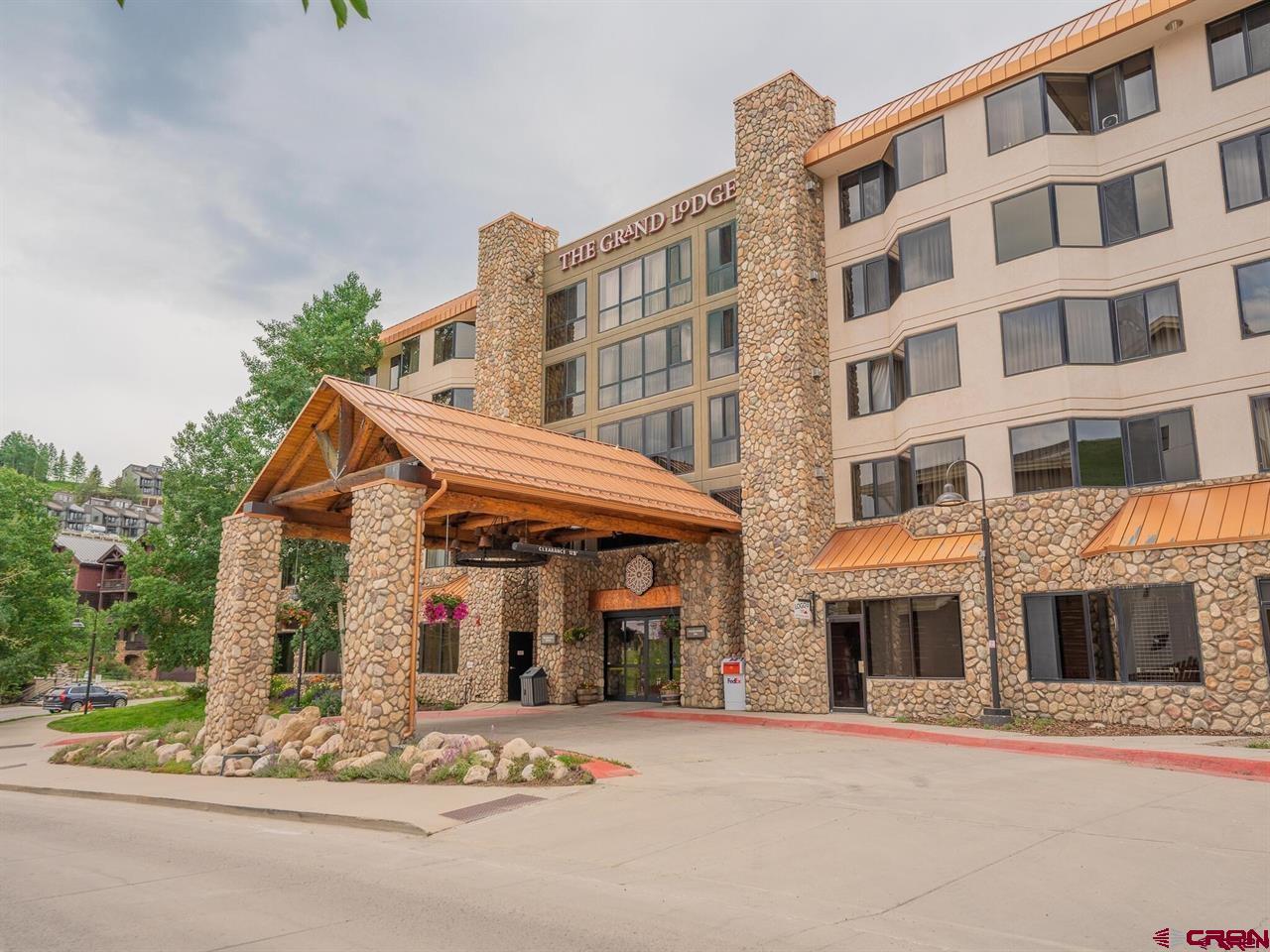 6 Emmons Road, Unit 521 Crested Butte, CO 81225 - Photo 13 of 19 a front view of a building