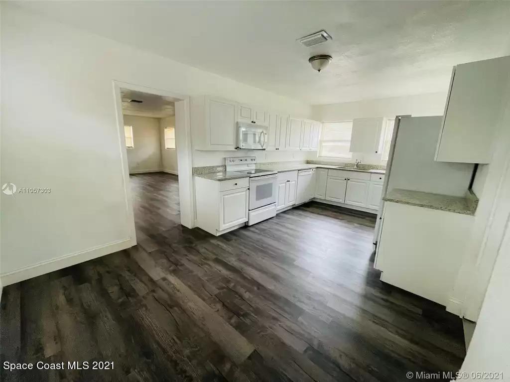 2419 Clearlake Road Cocoa, FL 32922 - Photo 9 of 27 wider view of kitchen and breakfast area