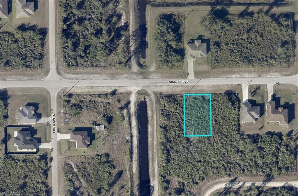 902 Grant Boulevard Lehigh Acres, FL 33974 - Photo 3 of 4 a view of water heater room