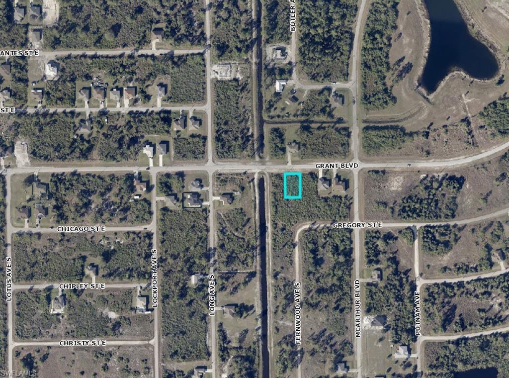 902 Grant Boulevard Lehigh Acres, FL 33974 - Photo 4 of 4 a view of a bathroom with a shower