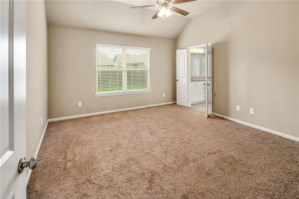 2027 Stubbs Drive Bryan, TX 77807 - Photo 11 of 23 Unfurnished bedroom with connected bathroom, a cei