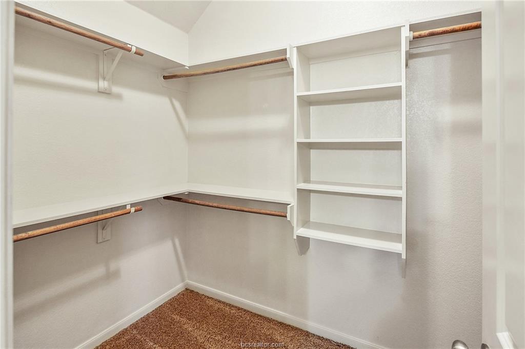 2027 Stubbs Drive Bryan, TX 77807 - Photo 15 of 23 Spacious closet with carpet floors and lofted ceil